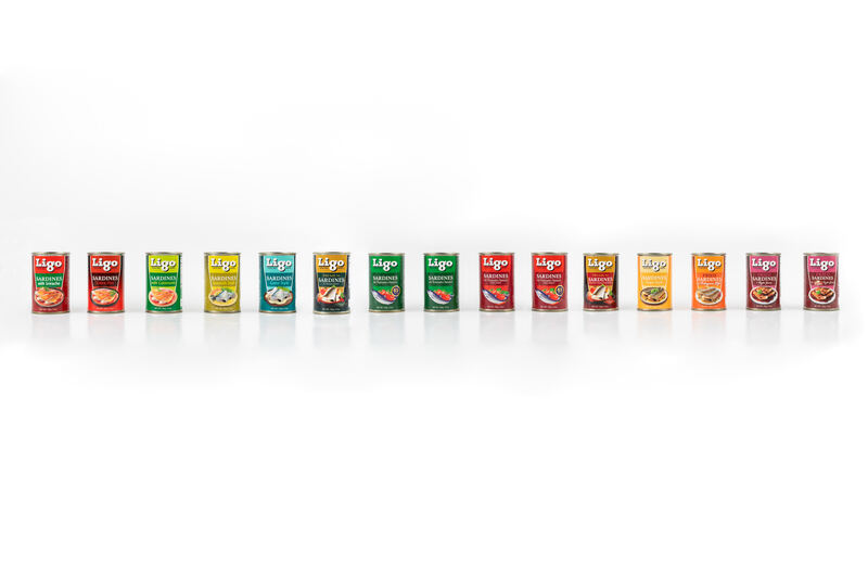 A row of Ligo sardine cans in assorted colours on white